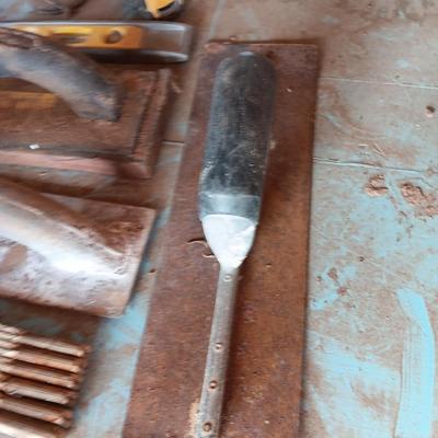 Assortment of tools - cement trowels - oil can - tape measure and more