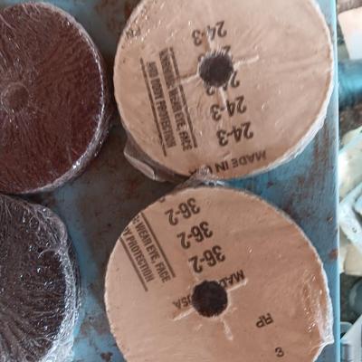 LOTS of new packages of 4" sanding pad / disks