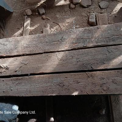 Six landscape timers and a roll of lawn and garden edging