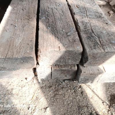 Six landscape timers and a roll of lawn and garden edging