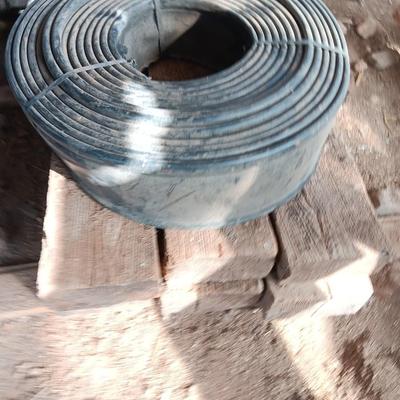 Six landscape timers and a roll of lawn and garden edging