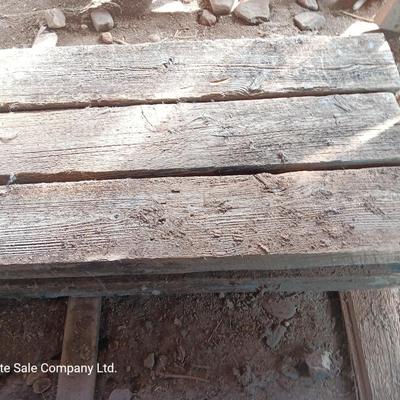 Six landscape timers and a roll of lawn and garden edging