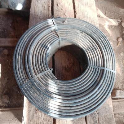 Six landscape timers and a roll of lawn and garden edging