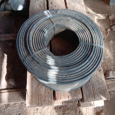 Six landscape timers and a roll of lawn and garden edging