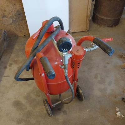 Pressurized sandblaster with hose and instructions