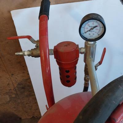 Pressurized sandblaster with hose and instructions