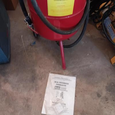 Pressurized sandblaster with hose and instructions