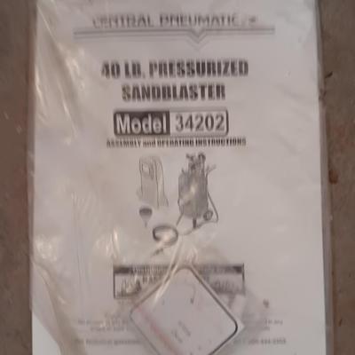 Pressurized sandblaster with hose and instructions
