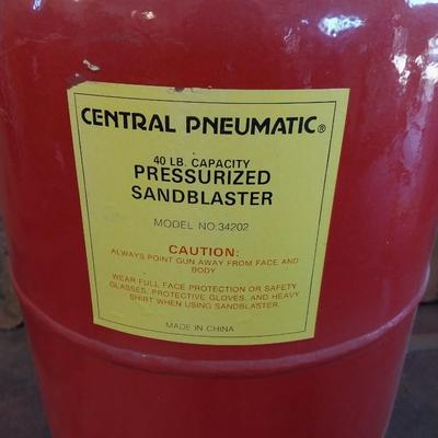 Pressurized sandblaster with hose and instructions