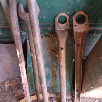 Antique tools - handmade post pounder - prybars - and an assortment of other steel tools