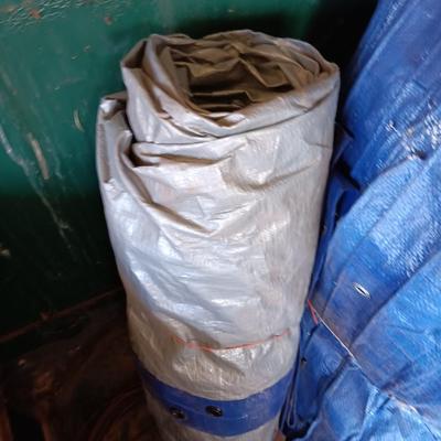 Two tarps with metal grommets