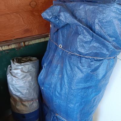 Two tarps with metal grommets