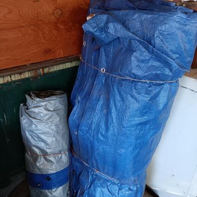 Two tarps with metal grommets