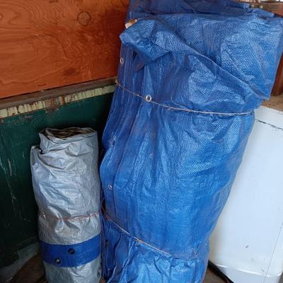 Two tarps with metal grommets