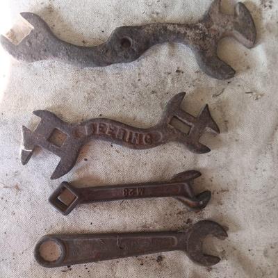 Four antique wrenches with unique ends - Dearing