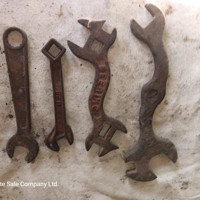 Four antique wrenches with unique ends - Dearing