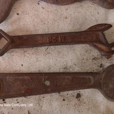 Four antique wrenches with unique ends - Dearing