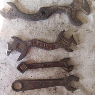 Four antique wrenches with unique ends - Dearing
