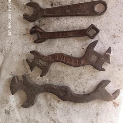 Four antique wrenches with unique ends - Dearing