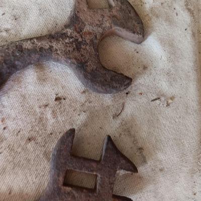 Four antique wrenches with unique ends - Dearing