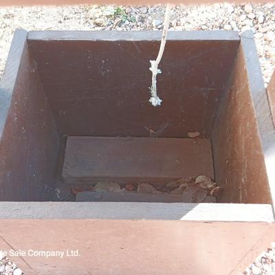 Wishing well yard decor / planter box and a wooden bird feeder