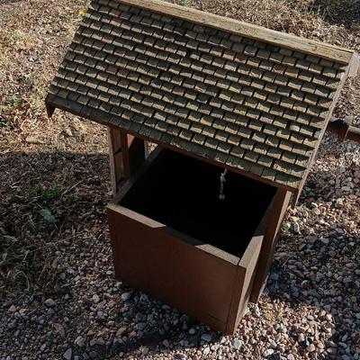 Wishing well yard decor / planter box and a wooden bird feeder