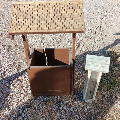 Wishing well yard decor / planter box and a wooden bird feeder