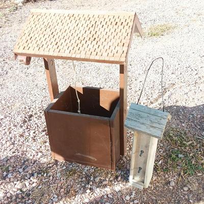 Wishing well yard decor / planter box and a wooden bird feeder