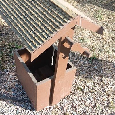 Wishing well yard decor / planter box and a wooden bird feeder