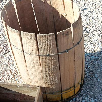 Two wooden rustic boxes and a wooden barrel for display