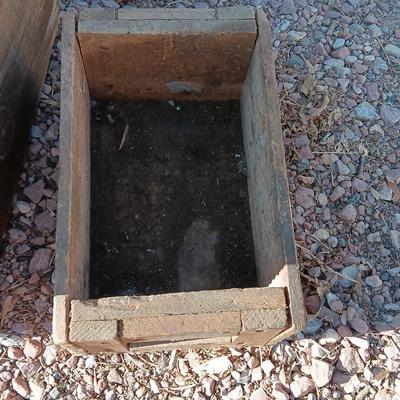 Two wooden rustic boxes and a wooden barrel for display