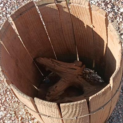 Two wooden rustic boxes and a wooden barrel for display