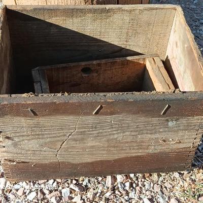 Two wooden rustic boxes and a wooden barrel for display