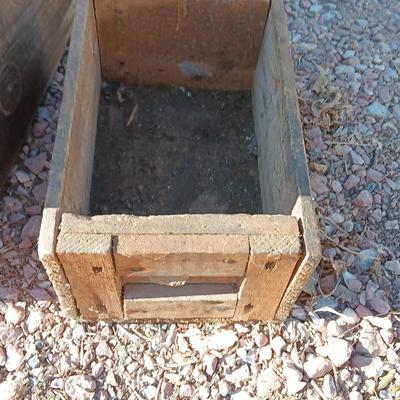 Two wooden rustic boxes and a wooden barrel for display