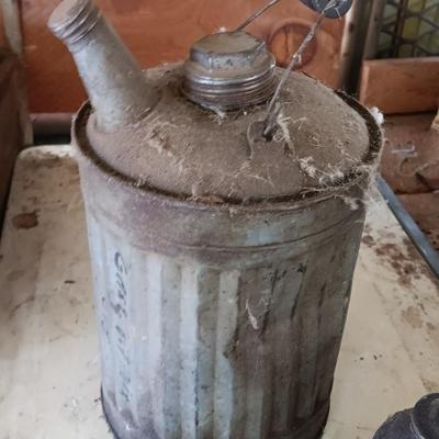 Galvanized metal oil can and smaller oil cans and gas measuring tin