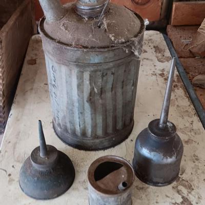Galvanized metal oil can and smaller oil cans and gas measuring tin