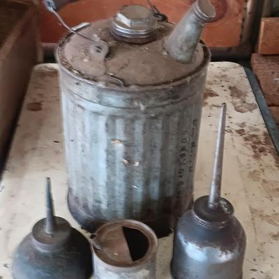 Galvanized metal oil can and smaller oil cans and gas measuring tin