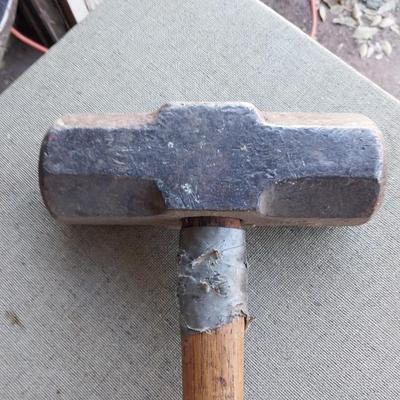 Long handled sledgehammer and crowbar