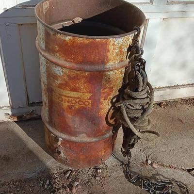 Metal Conoco barrel and a unique steel antique pully / block and tackle