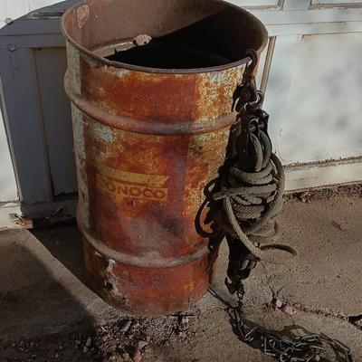 Metal Conoco barrel and a unique steel antique pully / block and tackle