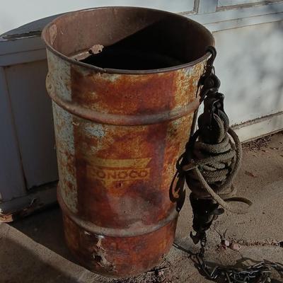 Metal Conoco barrel and a unique steel antique pully / block and tackle