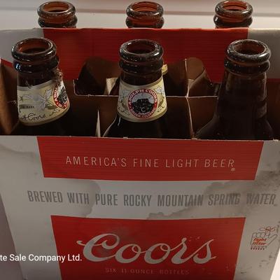 Antique Anheuser Busch and Otto Frey cork screws with Coors glass bottles and booklet