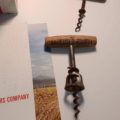 Antique Anheuser Busch and Otto Frey cork screws with Coors glass bottles and booklet