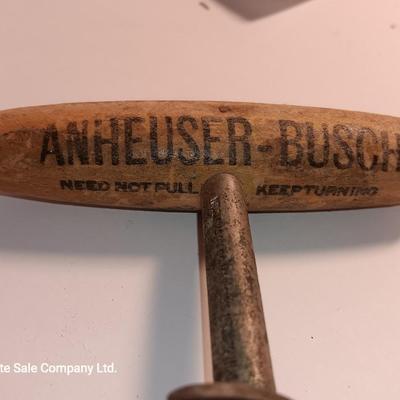 Antique Anheuser Busch and Otto Frey cork screws with Coors glass bottles and booklet
