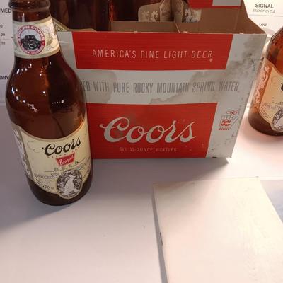 Antique Anheuser Busch and Otto Frey cork screws with Coors glass bottles and booklet