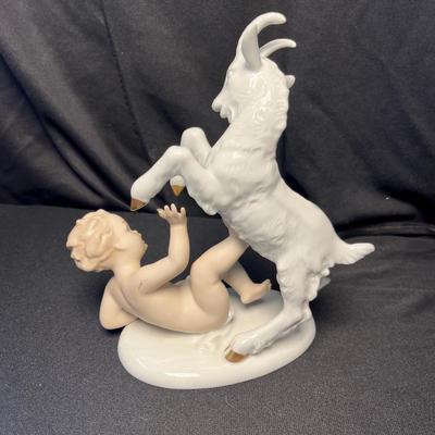 Goat & boy figure