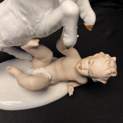 Goat & boy figure