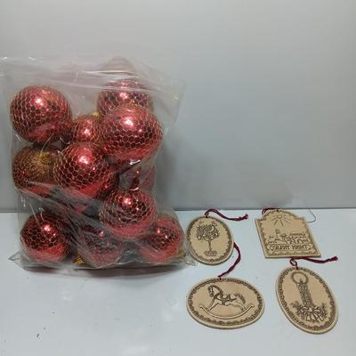 Christmas bulbs in gold colored netting and 4 ceramic ornaments