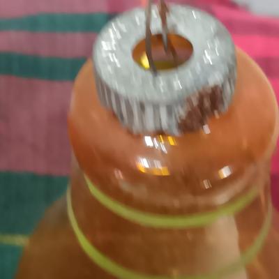 Four vintage glass bell ornaments - shiny Brite red and yellow
