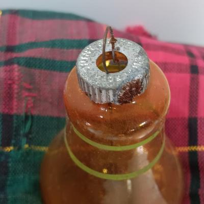 Four vintage glass bell ornaments - shiny Brite red and yellow